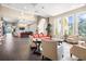 Spacious lounge area with stylish furniture, large windows, and elegant decor, creating a welcoming atmosphere at 13486 Nobilio St, Venice, FL 34293