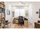 Well-lit office with built-in shelving and neutral color palette at 13486 Nobilio St, Venice, FL 34293