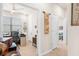 Bright home office with a ceiling fan, multiple windows, and neutral decor at 13486 Nobilio St, Venice, FL 34293