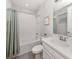 Clean bathroom featuring a shower-tub combo, a white vanity, and modern fixtures at 15364 Isla Palma Ln, Nokomis, FL 34275
