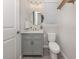 Charming bathroom features a stylish vanity, round mirror, and modern fixtures at 15364 Isla Palma Ln, Nokomis, FL 34275