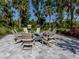 Outdoor fire pit area with comfortable seating, perfect for gatherings and relaxation at 15364 Isla Palma Ln, Nokomis, FL 34275