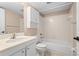 Bathroom featuring a vanity, toilet, and tub with shower at 1728 S Lakeside Dr # 1720B, Venice, FL 34293