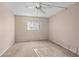 Neutral bedroom featuring a ceiling fan and window letting in natural light at 1728 S Lakeside Dr # 1720B, Venice, FL 34293