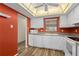 Bright kitchen features white cabinets, modern appliances, and updated fixtures at 1728 S Lakeside Dr # 1720B, Venice, FL 34293