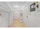 Laundry room boasts extensive shelving for organization and convenience at 1728 S Lakeside Dr # 1720B, Venice, FL 34293