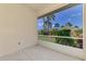 Outdoor patio featuring views of tropical landscaping and manicured lawns at 1799 Fountain View Cir, Venice, FL 34292