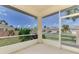 Screened-in patio showcasing beautiful landscaping and views of the community at 1799 Fountain View Cir, Venice, FL 34292