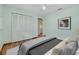 Serene bedroom with an inviting decor, closet, and hardwood floors at 18375 Lamont Ave, Port Charlotte, FL 33948