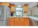 Kitchen featuring stainless steel appliances, granite countertops, and ample storage at 18375 Lamont Ave, Port Charlotte, FL 33948