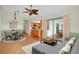 Open floor plan with a living room leading to a dining area and modern kitchen at 18375 Lamont Ave, Port Charlotte, FL 33948