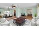 Open concept living area seamlessly connecting the living room and dining space at 18375 Lamont Ave, Port Charlotte, FL 33948