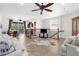 Open living space showcasing a view to a balcony, neutral tones, and tile floors at 186 Portofino Dr, Nokomis, FL 34275