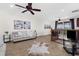 Bright living area featuring neutral tones, stylish decor, and seamless indoor-outdoor flow with tile floors at 186 Portofino Dr, Nokomis, FL 34275
