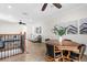 Upstairs loft offering a dining table and a seating area, complete with stylish decor at 186 Portofino Dr, Nokomis, FL 34275