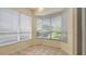 Bay window floods this breakfast nook with natural light; view of outdoor area at 201 Vestavia Dr, Venice, FL 34292