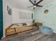 A bedroom with custom wave art at 2020 E Crest Dr, Englewood, FL 34223