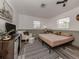 Neutral bedroom with modern vinyl flooring and a comfortable aesthetic at 2020 E Crest Dr, Englewood, FL 34223