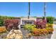 Community Center signage amidst colorful landscaping promotes a vibrant, welcoming neighborhood atmosphere at 2034 Mesic Hammock Way, Venice, FL 34292