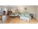 Bright bedroom with hardwood floors, two beds and waterfront view at 205 Louella Ln, Nokomis, FL 34275