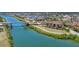 Aerial view of the property showing the building near the waterway and nearby bridge at 209 E Venice Ave, Venice, FL 34285