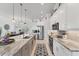 Gourmet kitchen featuring stainless appliances, granite countertops and tile backsplash at 209 E Venice Ave, Venice, FL 34285
