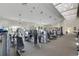 Bright and airy gym with skylights and an array of fitness machines for a complete workout at 2104 Batello Dr, Venice, FL 34292
