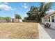 A large backyard offers relaxation space, storage, and an opportunity for entertaining at 219 Capatola St, Port Charlotte, FL 33948