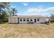 A large backyard offers space for seating, relaxation, and outdoor activities at 219 Capatola St, Port Charlotte, FL 33948