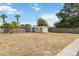 Expansive lot features a storage shed, providing ample space for outdoor activities and storage at 219 Capatola St, Port Charlotte, FL 33948