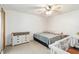 Comfortable bedroom featuring natural light, and modern ceiling fan fixture at 219 Capatola St, Port Charlotte, FL 33948