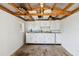 Shed features a window, white cabinets and work area providing extra storage and workspace at 219 Capatola St, Port Charlotte, FL 33948