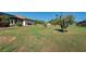 Spacious, well-maintained backyard with green grass and room for outdoor activities at 2194 Abalom St, Punta Gorda, FL 33980