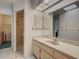 Bright bathroom with shower, vanity, and mirrored medicine cabinet at 2194 Abalom St, Punta Gorda, FL 33980
