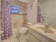 Bathroom showcasing a shower/tub combo and single sink vanity at 2194 Abalom St, Punta Gorda, FL 33980