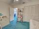 Bedroom with a closet, bed, shelving, and green carpet at 2194 Abalom St, Punta Gorda, FL 33980