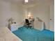 Bedroom with a desk, bed, and green carpet at 2194 Abalom St, Punta Gorda, FL 33980