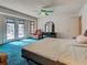 Bright bedroom with a bay window and French doors leading to an outdoor area at 2194 Abalom St, Punta Gorda, FL 33980
