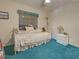 Bedroom with a daybed, teddy bears, and green carpet at 2194 Abalom St, Punta Gorda, FL 33980