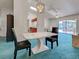 Open floor plan showcasing dining area, kitchen view, and access to screened lanai at 2194 Abalom St, Punta Gorda, FL 33980