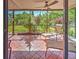 Relaxing screened lanai with seating to enjoy the landscaped yard and outdoor serenity at 2194 Abalom St, Punta Gorda, FL 33980