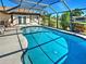 Private enclosed pool with spacious lanai and well-maintained landscaping, great for outdoor enjoyment at 2194 Abalom St, Punta Gorda, FL 33980
