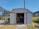 Exterior view of a functional shed with open doors offering additional storage space at 2194 Abalom St, Punta Gorda, FL 33980