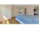 Bright bedroom featuring built-in closets and a ceiling fan for added comfort at 232 Saint Augustine Ave # 701, Venice, FL 34285