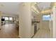 Functional kitchen featuring modern appliances and opening into a bright living area with water views at 232 Saint Augustine Ave # 701, Venice, FL 34285