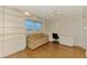 Comfortable living room with built-in shelving and a scenic window view at 232 Saint Augustine Ave # 701, Venice, FL 34285