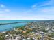 Gorgeous waterfront community with private boat docks, lush vegetation, and waterfront views of the bay at 2322 Bayshore Rd, Nokomis, FL 34275