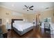 Spacious bedroom offers hardwood floors, ceiling fan, and a vanity area at 2322 Bayshore Rd, Nokomis, FL 34275