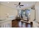 Lovely Bedroom with hardwood floors, ceiling fan, and bright natural light at 2322 Bayshore Rd, Nokomis, FL 34275