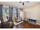 Charming Bedroom features hardwood floors, cozy seating, and natural light at 2322 Bayshore Rd, Nokomis, FL 34275